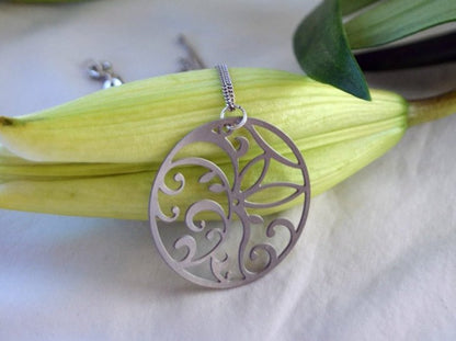 Floral Circle Pendant in stainless steel